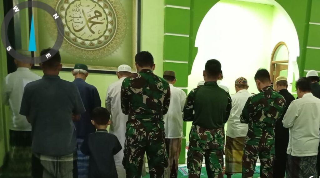 Meski Diguyur Hujan, Kebersamaan Satgas TMMD dan Warga Tetap Terjalin